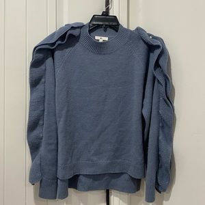 Blue sweater with pearls on the sides